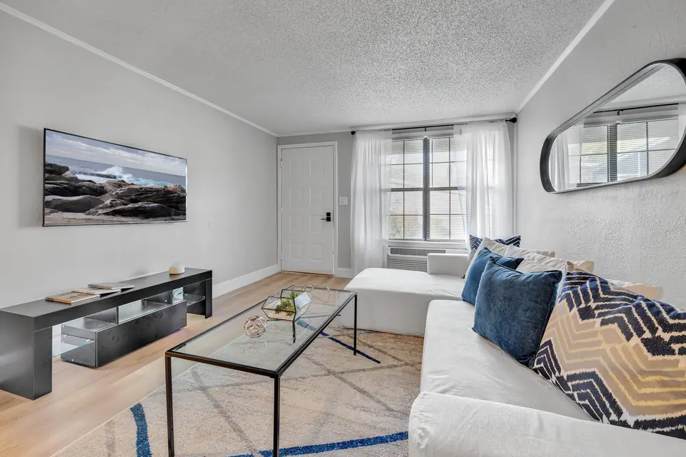 A furnished apartment living room at Jax Bay in Jacksonville, Florida.