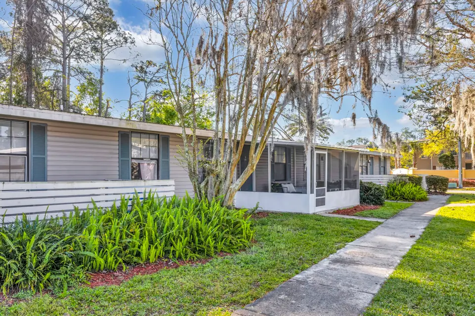 A tree-lined community walkway at Jax Bay in Jacksonville, Florida.