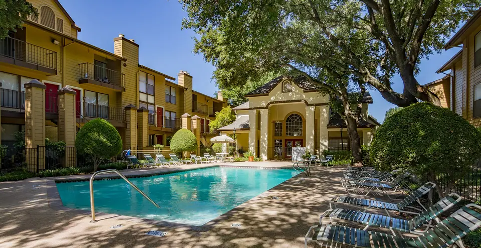 The landscaped apartment community at Regal Court in Dallas, Texas.